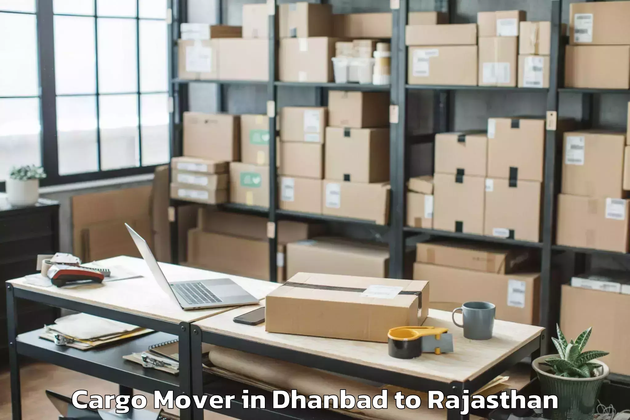 Top Dhanbad to Rajakhera Cargo Mover Available